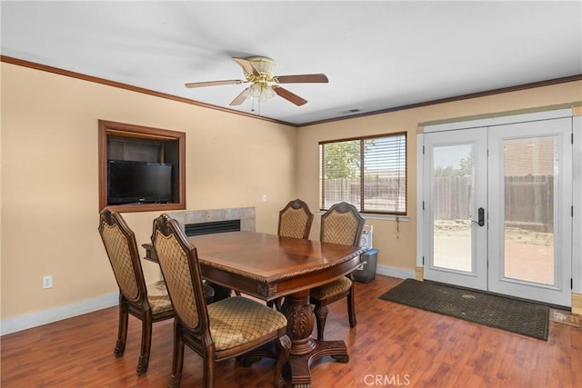 2306 Apion Ct, Paso Robles, CA 93446 - dining room with french doors, ceiling fan, wood finished floors, and crown molding