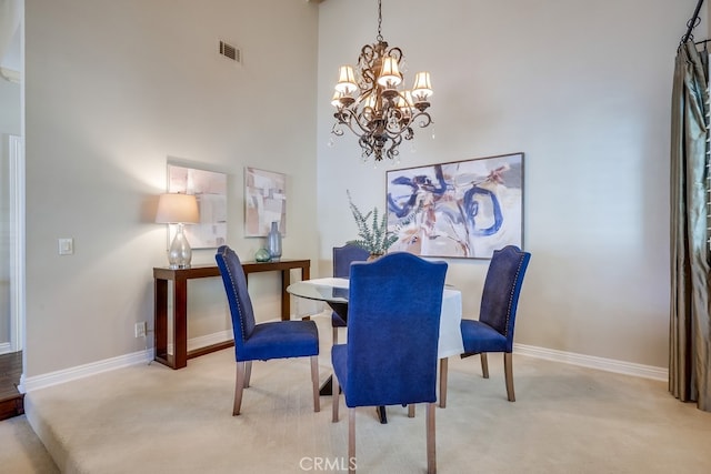 9230 Whitney Way, Cypress, CA 90630 - dining area with a chandelier, light colored carpet, and a towering ceiling