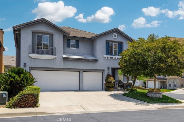 4450 Autumn Glow Ct, Chino Hills, CA 91709 - view of front of house featuring an attached garage, stucco siding, concrete driveway, and a tile roof