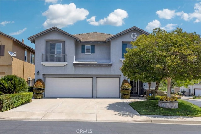 4450 Autumn Glow Ct, Chino Hills, CA 91709 - view of front of home featuring stucco siding, a garage, and concrete driveway