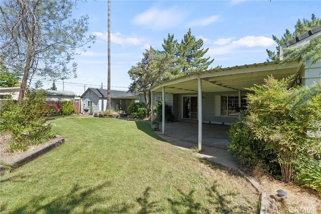 1603 Colusa St, Corning, CA 96021 - view of green lawn with a patio