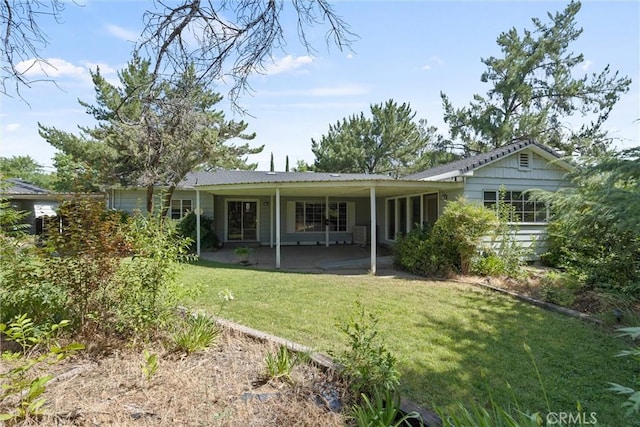 1603 Colusa St, Corning, CA 96021 - rear view of house with a lawn