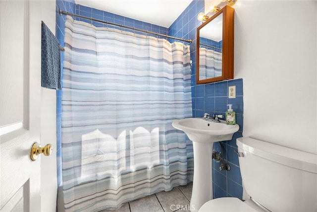 2051 Royal Oaks Dr, Duarte, CA 91010 - bathroom with tile walls and tile patterned floors