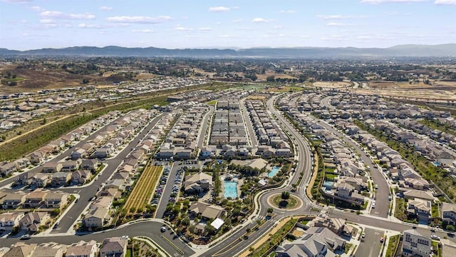 32755 Brunello Way, Temecula, CA 92591 - aerial view of property's location featuring a mountain backdrop and nearby suburban area
