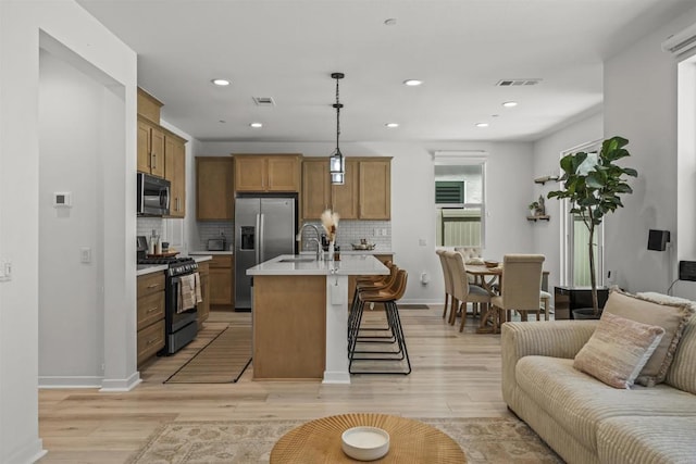 32755 Brunello Way, Temecula, CA 92591 - living area featuring light wood-style flooring and recessed lighting