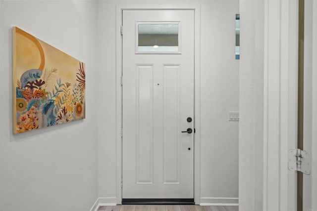 32755 Brunello Way, Temecula, CA 92591 - doorway to outside with baseboards and wood finished floors