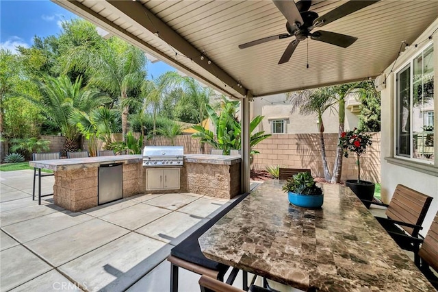46379 Canyon Crest Ct, Temecula, CA 92592 - fenced backyard with exterior kitchen, a patio, and ceiling fan