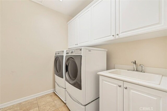 46379 Canyon Crest Ct, Temecula, CA 92592 - laundry area featuring washing machine and dryer and cabinet space