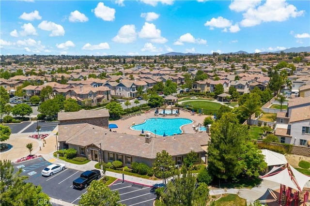 46379 Canyon Crest Ct, Temecula, CA 92592 - aerial perspective of suburban area featuring a pool and a mountainous background