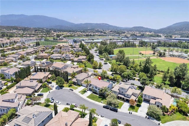 46379 Canyon Crest Ct, Temecula, CA 92592 - aerial view of property and surrounding area featuring a mountainous background and nearby suburban area
