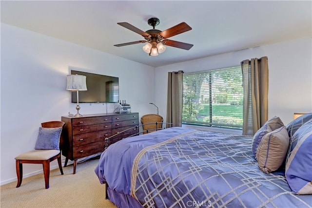 3205 Via Buena Unit B, Laguna Woods, CA 92637 - carpeted bedroom with a ceiling fan and baseboards