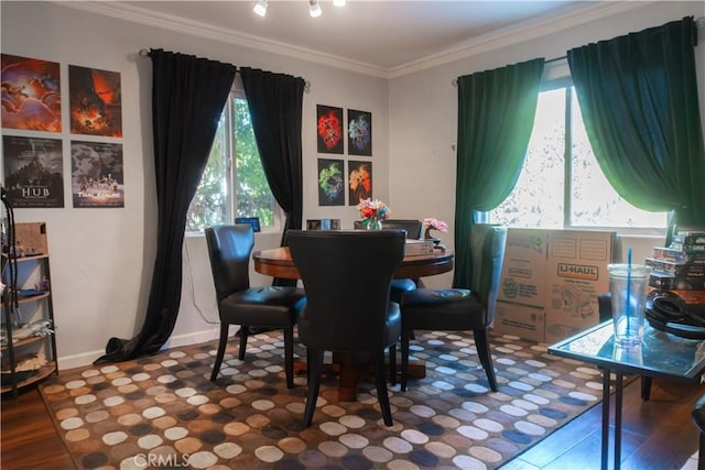 3801 Whiteside St, Los Angeles, CA 90063 - dining space featuring plenty of natural light, wood finished floors, and ornamental molding