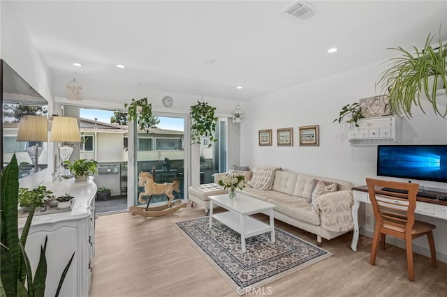 1722 Westcliff Dr Unit 11, Newport Beach, CA 92660 - living area with light wood-style flooring and recessed lighting
