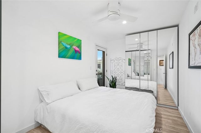 1722 Westcliff Dr Unit 11, Newport Beach, CA 92660 - bedroom featuring wood finished floors, recessed lighting, and ceiling fan