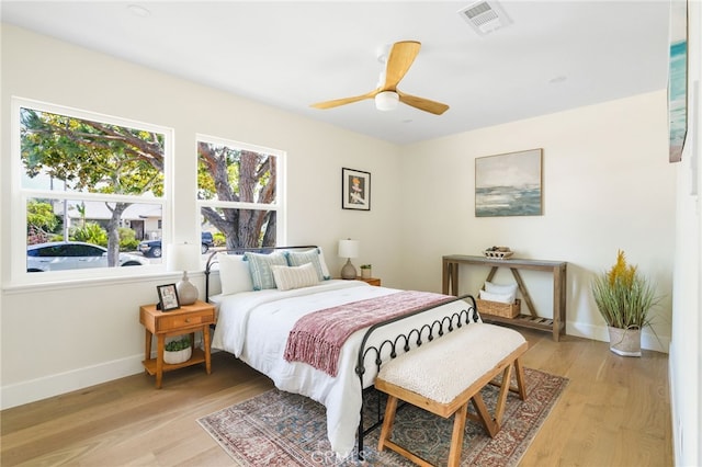 2721 184th St, Redondo Beach, CA 90278 - bedroom with multiple windows, light wood finished floors, and ceiling fan