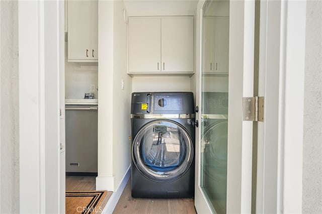 2721 184th St, Redondo Beach, CA 90278 - washroom with washer / clothes dryer, wood finished floors, and cabinet space