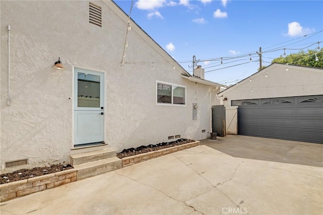 19125 Anza Ave, Torrance, CA 90503 - exterior space featuring stucco siding, entry steps, crawl space, a garage, and an outbuilding
