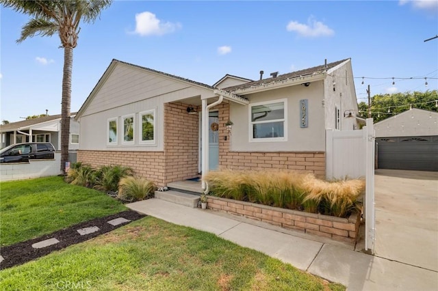 19125 Anza Ave, Torrance, CA 90503 - view of front facade with brick siding and a detached garage