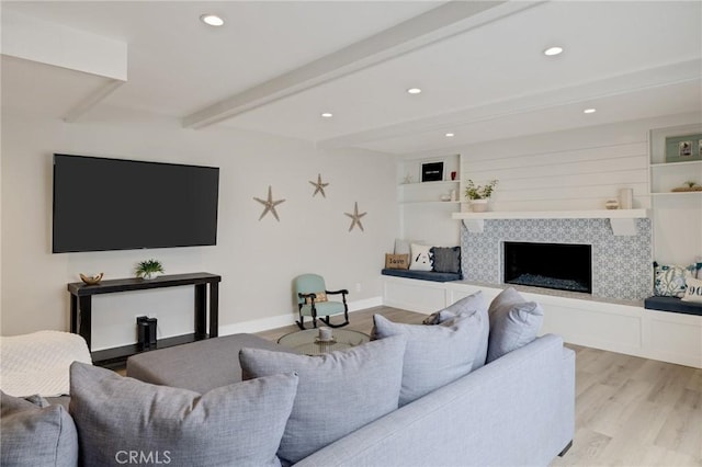 19125 Anza Ave, Torrance, CA 90503 - living area featuring beamed ceiling, light wood finished floors, a fireplace, and recessed lighting