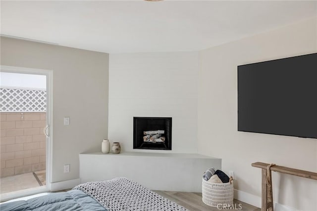 19125 Anza Ave, Torrance, CA 90503 - bedroom featuring a fireplace and baseboards