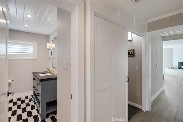 19125 Anza Ave, Torrance, CA 90503 - corridor featuring dark flooring, recessed lighting, and ornamental molding