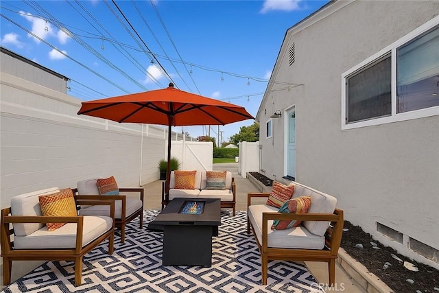 19125 Anza Ave, Torrance, CA 90503 - view of patio / terrace with an outdoor living space with a fire pit