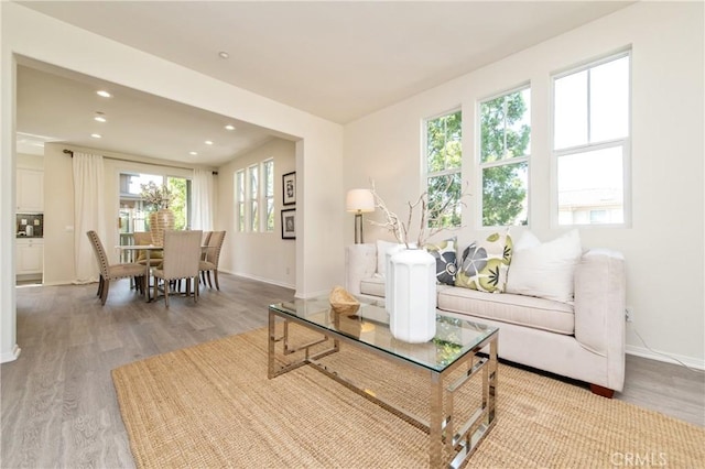 357 Flyers Ln, Tustin, CA 92782 - living area featuring light wood-style flooring and recessed lighting