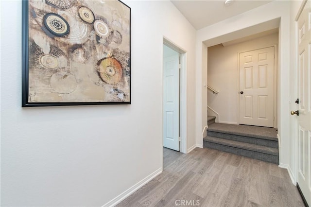 357 Flyers Ln, Tustin, CA 92782 - hallway with wood finished floors and stairway