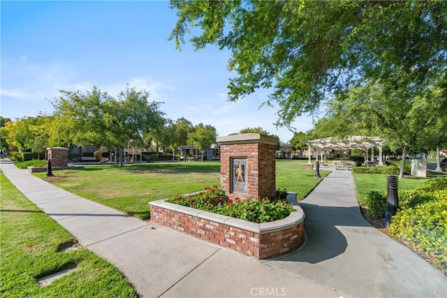 357 Flyers Ln, Tustin, CA 92782 - view of community with a pergola and a lawn