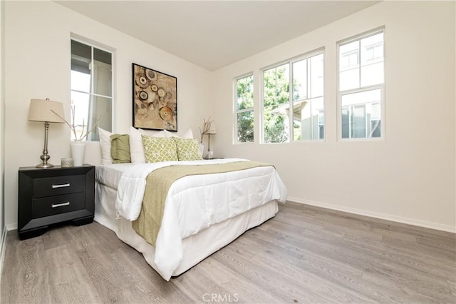 357 Flyers Ln, Tustin, CA 92782 - bedroom with wood finished floors and baseboards