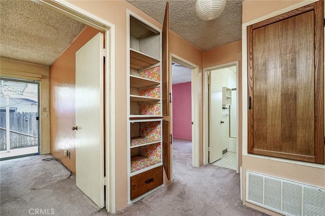 1510 E 53rd St, Long Beach, CA 90805 - hall featuring carpet floors and a textured ceiling