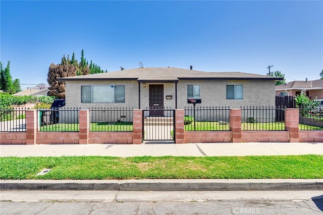 1510 E 53rd St, Long Beach, CA 90805 - bungalow featuring stucco siding, a fenced front yard, and roof with shingles