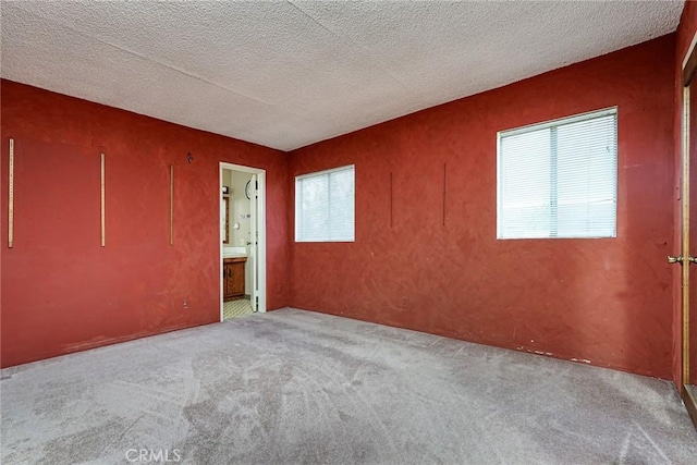 1510 E 53rd St, Long Beach, CA 90805 - carpeted empty room with plenty of natural light and a textured ceiling