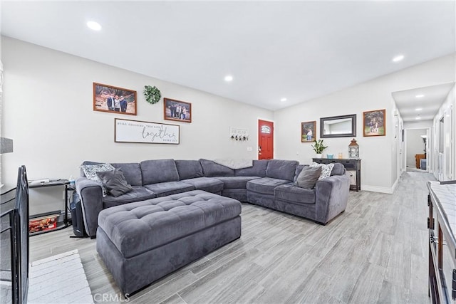 6057 Azalea St, Chino, CA 91710 - living area with light wood finished floors and recessed lighting