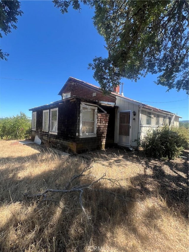 7366 Wight Way, Kelseyville, CA 95451 - rear view of property with board and batten siding