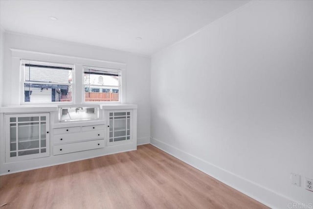 275 Euclid Ave, Long Beach, CA 90803 - unfurnished room with light wood finished floors and baseboards