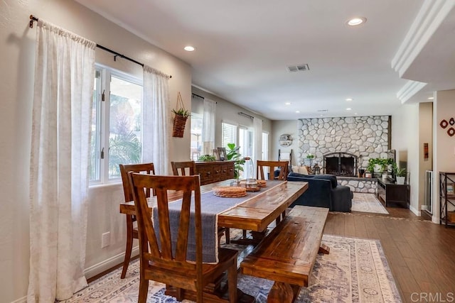 25322 Poderio Dr, Ramona, CA 92065 - dining space featuring wood-type flooring, a stone fireplace, and recessed lighting