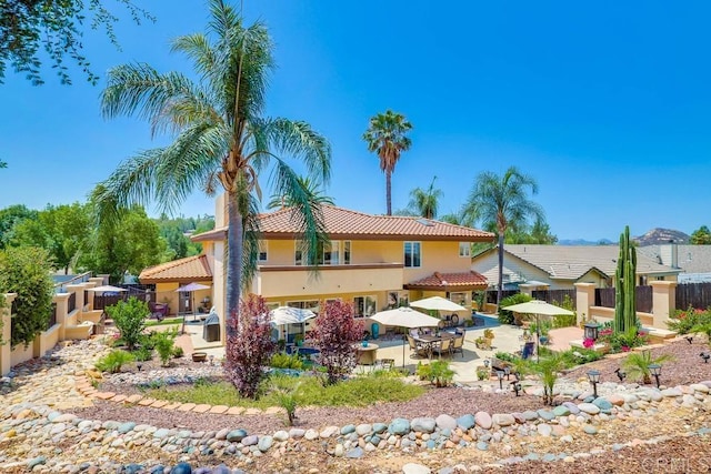 25322 Poderio Dr, Ramona, CA 92065 - back of property featuring stucco siding, a patio, and a tiled roof