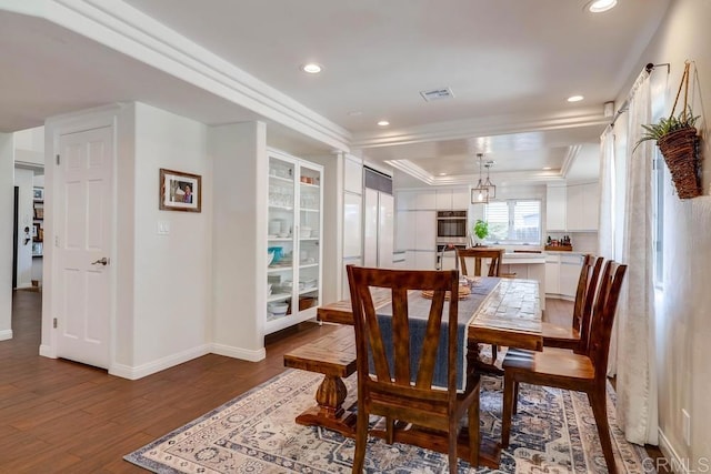 25322 Poderio Dr, Ramona, CA 92065 - dining area with a raised ceiling, crown molding, wood finished floors, and recessed lighting