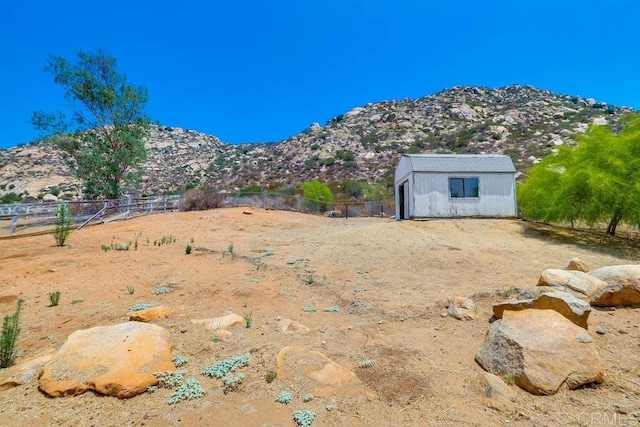 25322 Poderio Dr, Ramona, CA 92065 - view of yard with a mountain view and an outbuilding