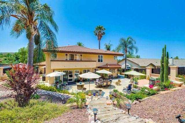 25322 Poderio Dr, Ramona, CA 92065 - back of house featuring stucco siding, a patio, a tile roof, and outdoor dining space