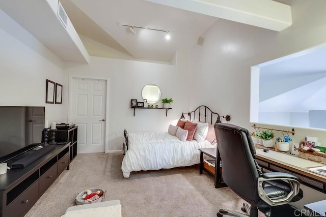 25322 Poderio Dr, Ramona, CA 92065 - bedroom with vaulted ceiling, rail lighting, light colored carpet, and an office area