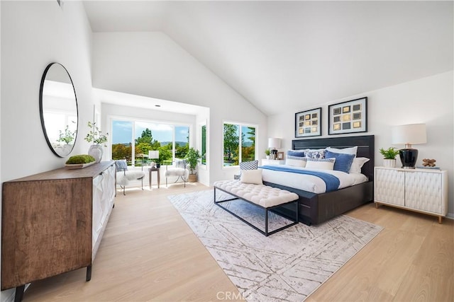 11 High, Laguna Niguel, CA 92677 - bedroom featuring high vaulted ceiling, light wood finished floors, and access to exterior