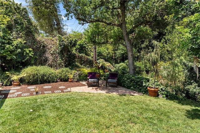 9858 Cullman Ave, Whittier, CA 90603 - view of grassy yard featuring a patio