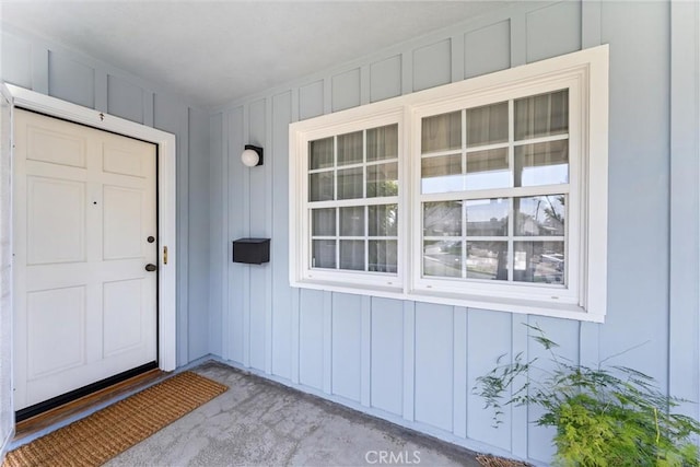 9858 Cullman Ave, Whittier, CA 90603 - doorway to property featuring board and batten siding and a porch