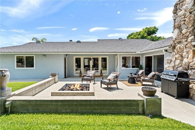 9858 Cullman Ave, Whittier, CA 90603 - rear view of house with a patio area, an outdoor living space with a fire pit, stucco siding, and a shingled roof