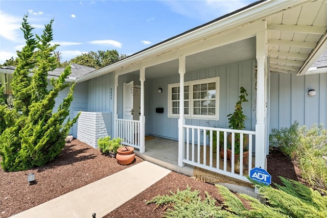 9858 Cullman Ave, Whittier, CA 90603 - view of exterior entry with covered porch and board and batten siding