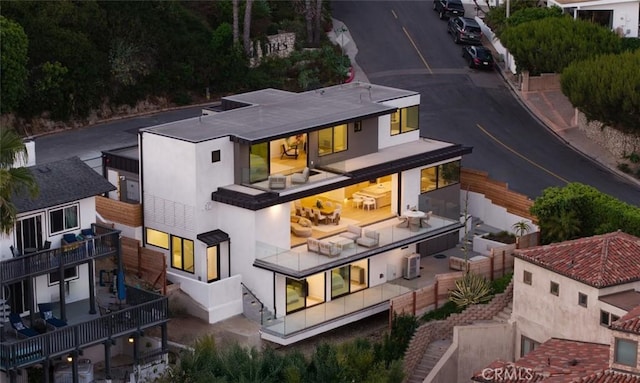 1105 Skyline Dr, Laguna Beach, CA 92651 - back of house featuring a balcony and stucco siding