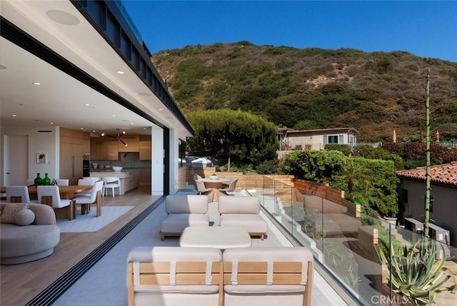 1105 Skyline Dr, Laguna Beach, CA 92651 - view of patio with outdoor dining area and a forest view