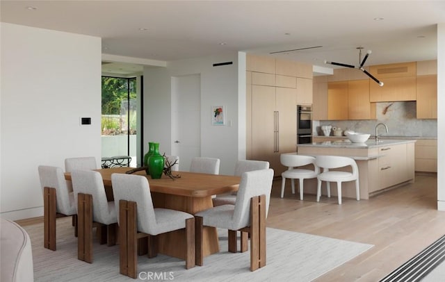 1105 Skyline Dr, Laguna Beach, CA 92651 - dining space with light wood-style flooring
